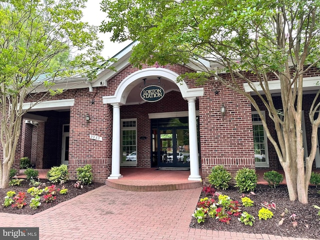 8980 Harrover Pl Unit 80B, Lorton, VA 22079 - property entrance featuring french doors and brick siding