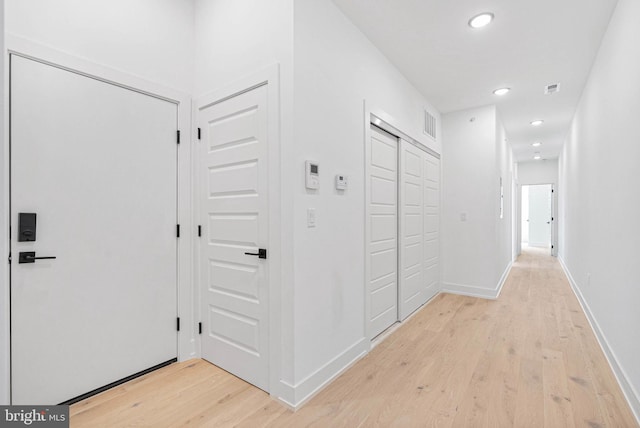 1338 N Franklin St, Philadelphia, PA 19122 - hallway with light wood finished floors and recessed lighting