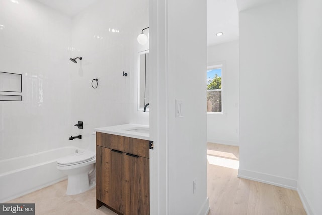 1338 N Franklin St, Philadelphia, PA 19122 - bathroom with vanity,  shower combination, recessed lighting, and wood finished floors