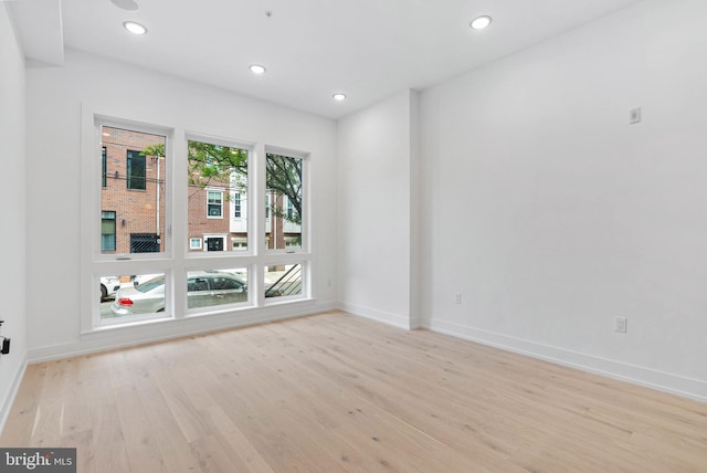 1338 N Franklin St, Philadelphia, PA 19122 - empty room featuring wood finished floors and recessed lighting
