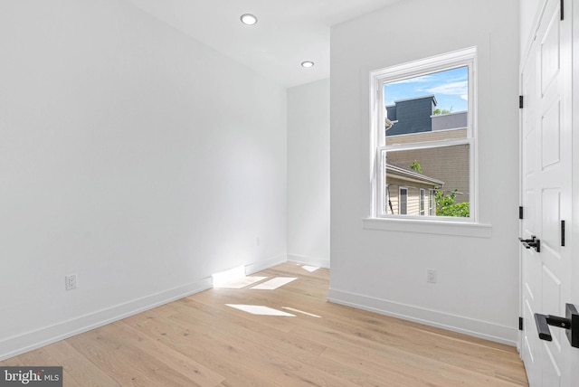 1338 N Franklin St, Philadelphia, PA 19122 - unfurnished room with wood finished floors, healthy amount of natural light, and recessed lighting