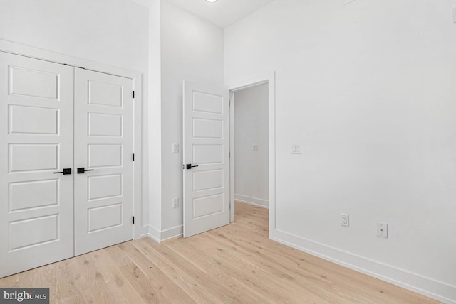 1338 N Franklin St, Philadelphia, PA 19122 - unfurnished bedroom with light wood-style flooring and a closet