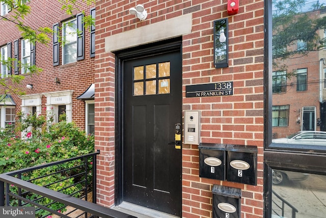 1338 N Franklin St, Philadelphia, PA 19122 - doorway to property with brick siding