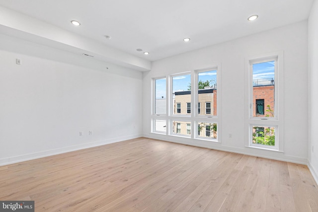 1338 N Franklin St, Philadelphia, PA 19122 - empty room with light wood-style flooring and recessed lighting