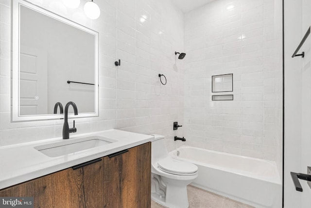 1338 N Franklin St, Philadelphia, PA 19122 - bathroom with vanity, shower / tub combination, tile patterned flooring, and tile walls
