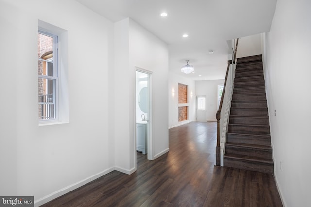 721 E 22nd St, Baltimore, MD 21218 - stairway with wood finished floors and recessed lighting
