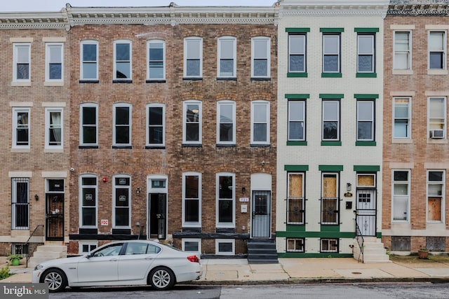 721 E 22nd St, Baltimore, MD 21218 - view of building exterior featuring entry steps and cooling unit