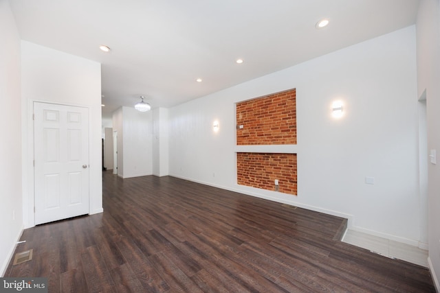 721 E 22nd St, Baltimore, MD 21218 - spare room with wood finished floors and recessed lighting