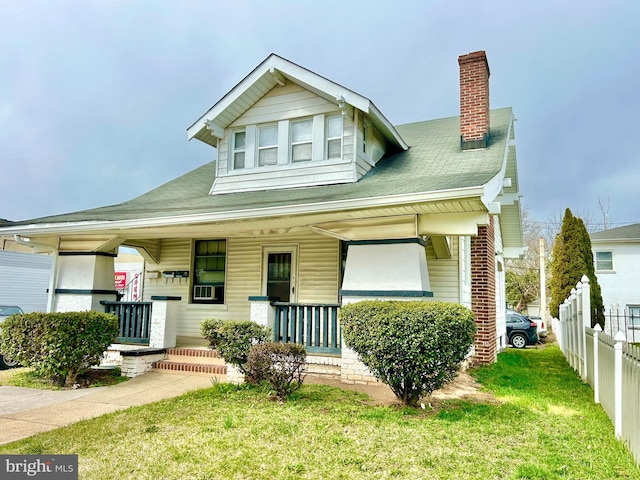 5904 Harford Rd, Baltimore, MD 21214 - view of front of home featuring covered porch, a chimney, and cooling unit