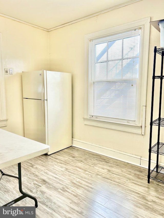 5904 Harford Rd, Baltimore, MD 21214 - kitchen featuring freestanding refrigerator and wood finished floors