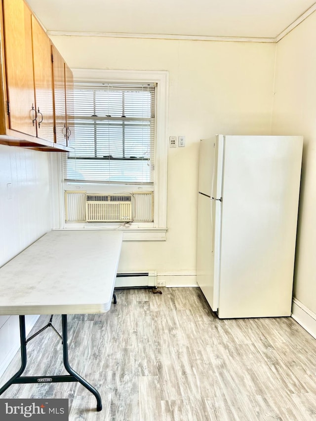 5904 Harford Rd, Baltimore, MD 21214 - kitchen with freestanding refrigerator, a baseboard radiator, light wood-style floors, and cooling unit