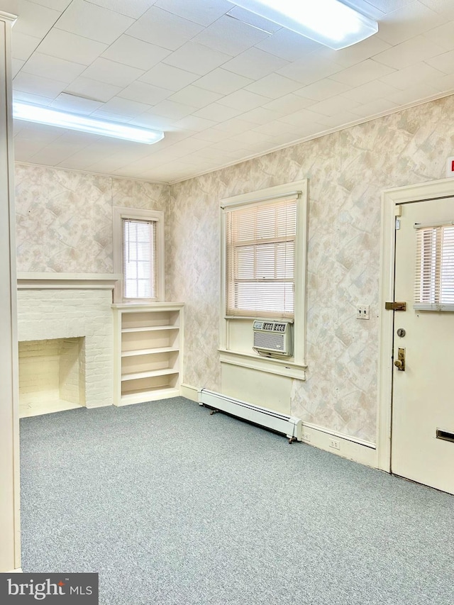 5904 Harford Rd, Baltimore, MD 21214 - unfurnished living room with a baseboard radiator, carpet floors, cooling unit, a fireplace, and wallpapered walls