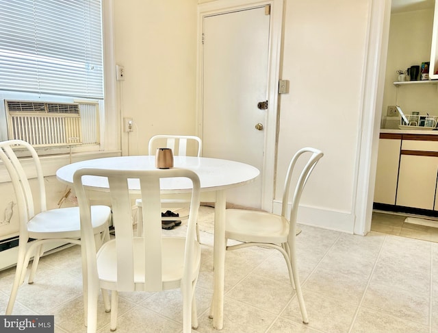 5904 Harford Rd, Baltimore, MD 21214 - dining space with light tile patterned floors