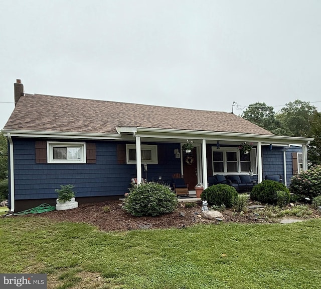 352 Almond Rd, Pittsgrove, NJ 08318 - ranch-style house featuring a shingled roof, a front yard, an outdoor hangout area, and a porch
