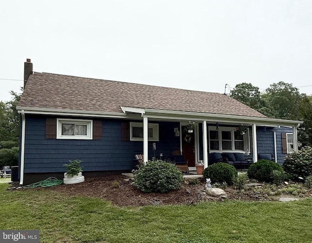 352 Almond Rd, Pittsgrove, NJ 08318 - view of front facade featuring a front yard, roof with shingles, an outdoor living space, and a chimney