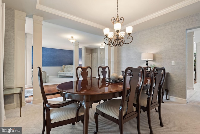 16 Fox Hollow Dr, Lancaster, PA 17602 - dining space featuring wallpapered walls, a chandelier, decorative columns, ornamental molding, and light carpet