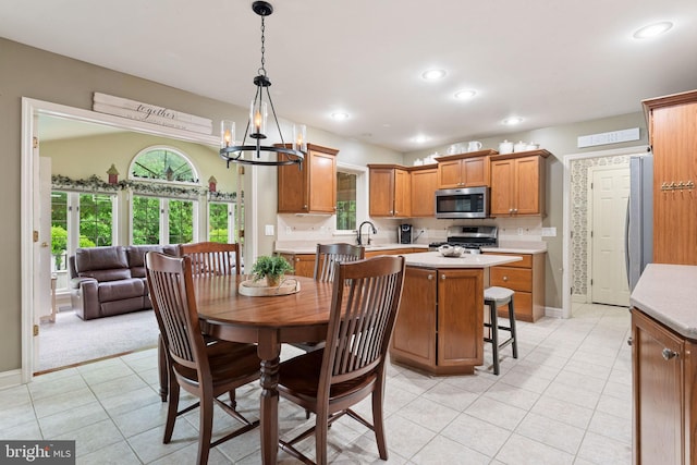 16 Fox Hollow Dr, Lancaster, PA 17602 - dining space with light tile patterned flooring, a chandelier, and recessed lighting