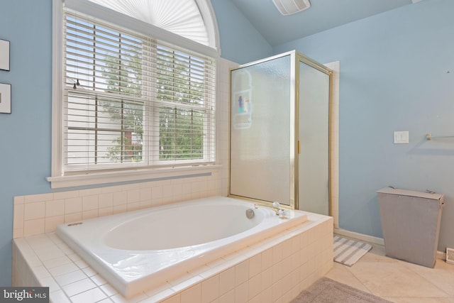 16 Fox Hollow Dr, Lancaster, PA 17602 - bathroom with plenty of natural light, a garden tub, a shower stall, and tile patterned flooring