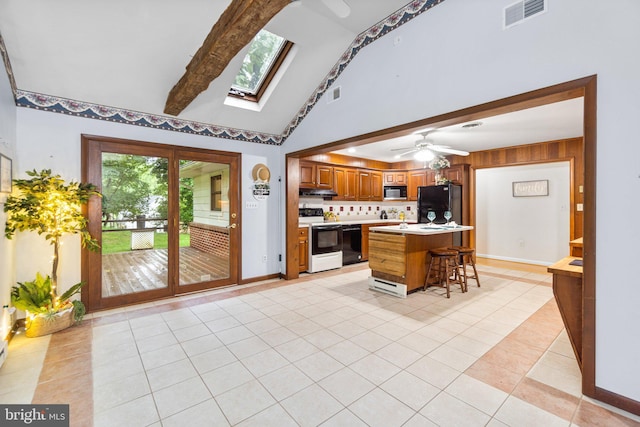 643 Meadow Branch Rd, Westminster, MD 21158 - kitchen with black appliances, light tile patterned floors, light countertops, brown cabinets, and beam ceiling