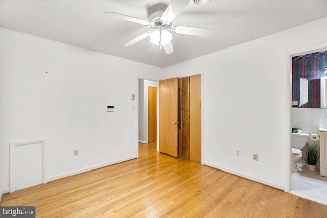 643 Meadow Branch Rd, Westminster, MD 21158 - unfurnished bedroom with light wood-type flooring and ensuite bath