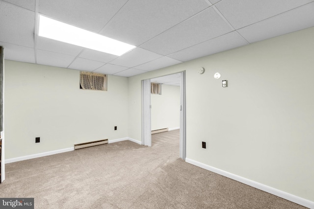 643 Meadow Branch Rd, Westminster, MD 21158 - finished below grade area featuring a baseboard heating unit, a drop ceiling, carpet flooring, and baseboard heating