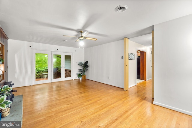 643 Meadow Branch Rd, Westminster, MD 21158 - unfurnished living room featuring a ceiling fan and light wood-style floors