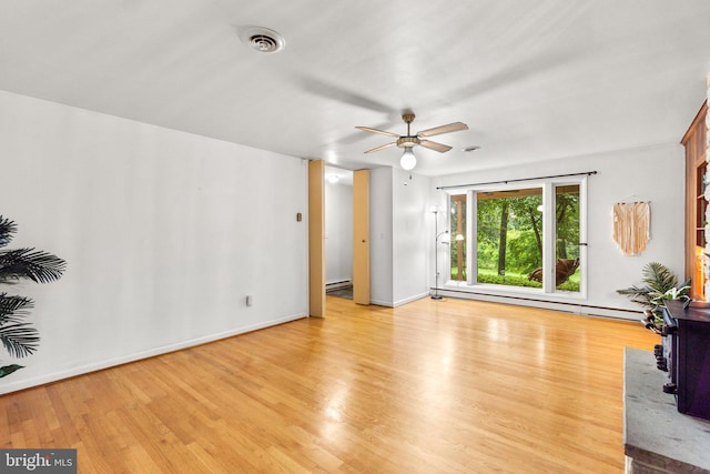 643 Meadow Branch Rd, Westminster, MD 21158 - unfurnished living room featuring ceiling fan, baseboard heating, and light wood-style floors