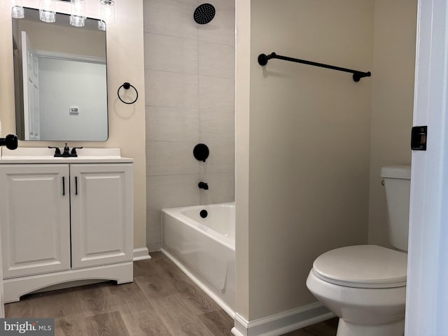 313 W Third St, Camden Wyoming, DE 19934 - bathroom featuring wood finished floors, vanity, and shower / bathtub combination