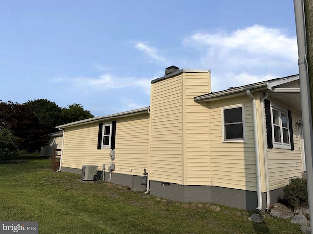 313 W Third St, Camden Wyoming, DE 19934 - view of home's exterior with a lawn, a chimney, and crawl space