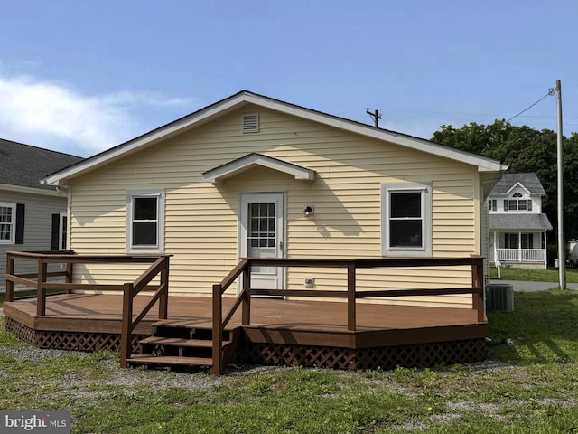 313 W Third St, Camden Wyoming, DE 19934 - rear view of property featuring a deck and a yard