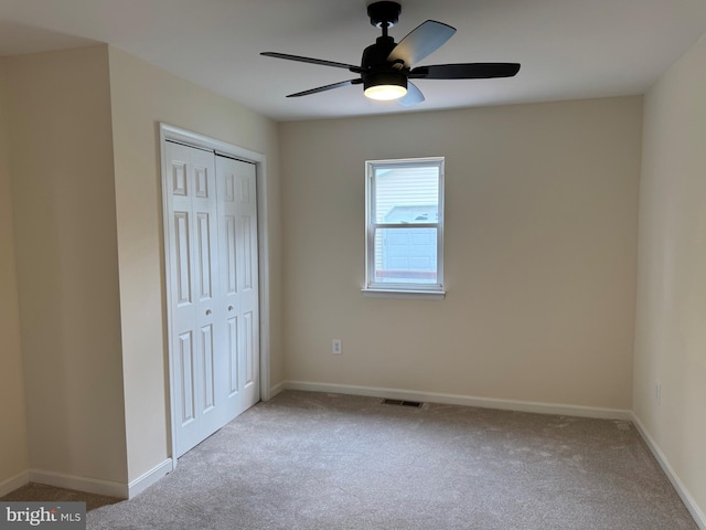 313 W Third St, Camden Wyoming, DE 19934 - unfurnished bedroom with carpet, a closet, and a ceiling fan