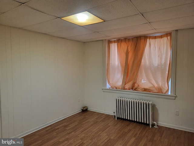 33 S Iowa Unit B1, Atlantic City, NJ 08401 - empty room featuring radiator, wood finished floors, and a paneled ceiling