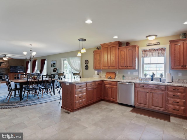 647 Warm Spring Rd, Chambersburg, PA 17202 - kitchen featuring stainless steel dishwasher, a peninsula, brown cabinetry, hanging light fixtures, and recessed lighting