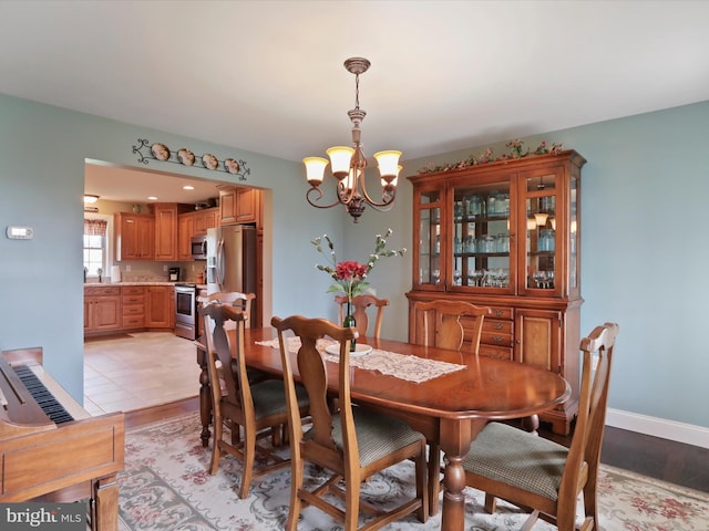 647 Warm Spring Rd, Chambersburg, PA 17202 - dining area featuring a chandelier and light wood finished floors