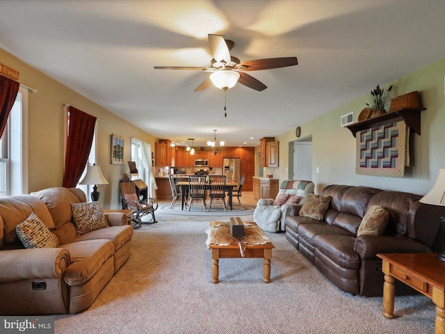 647 Warm Spring Rd, Chambersburg, PA 17202 - living area featuring ceiling fan and light colored carpet