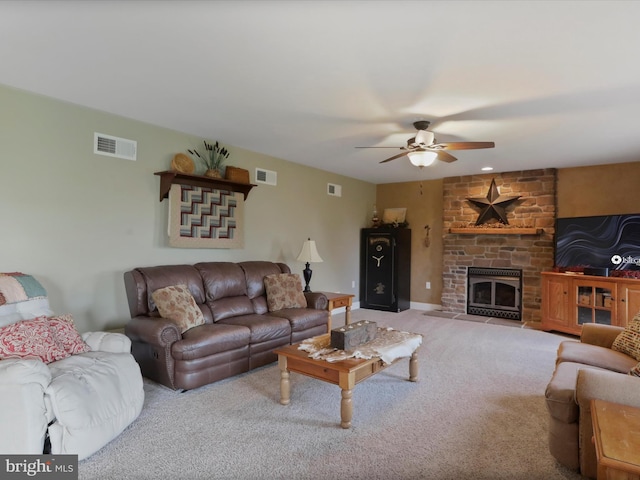 647 Warm Spring Rd, Chambersburg, PA 17202 - living area featuring a ceiling fan, carpet flooring, and a stone fireplace