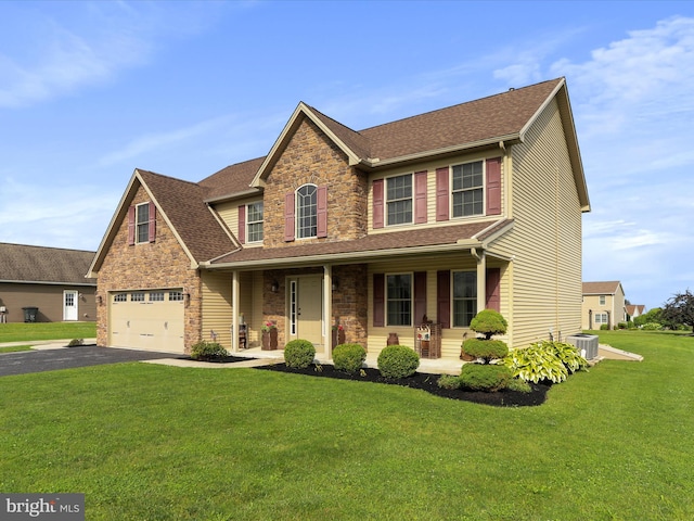 647 Warm Spring Rd, Chambersburg, PA 17202 - view of front of property with stone siding, a porch, an attached garage, and driveway