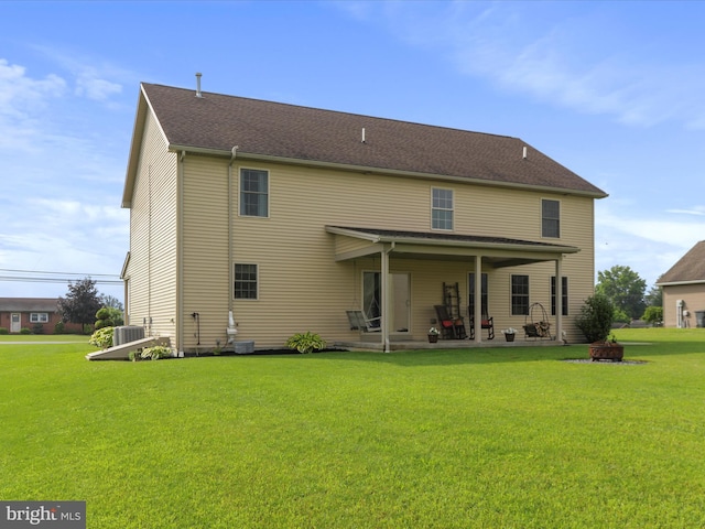 647 Warm Spring Rd, Chambersburg, PA 17202 - rear view of house featuring a yard, a patio area, and a fire pit