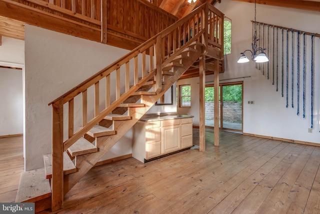 1801 Stringtown Rd, Sparks Glencoe, MD 21152 - stairway featuring wood-type flooring, a chandelier, and a towering ceiling