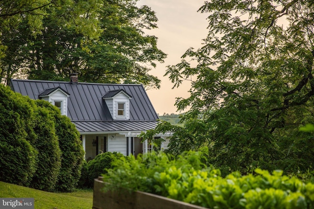 1801 Stringtown Rd, Sparks Glencoe, MD 21152 - view of front of property featuring a standing seam roof, a metal roof, and a chimney