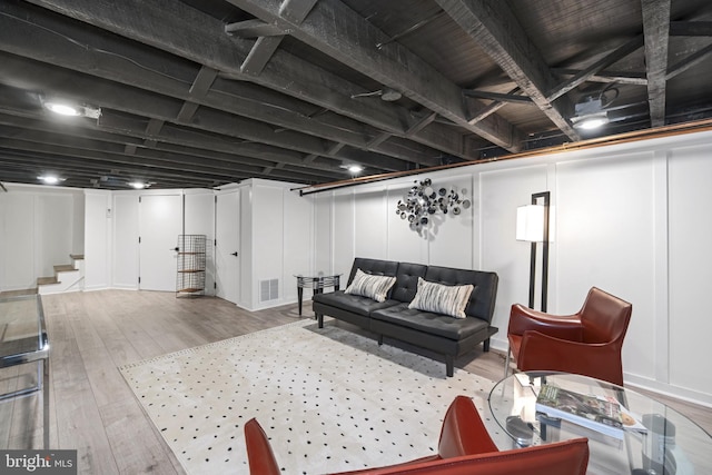 4300 Evans Chapel Rd, Baltimore, MD 21211 - living room featuring hardwood / wood-style flooring and stairway