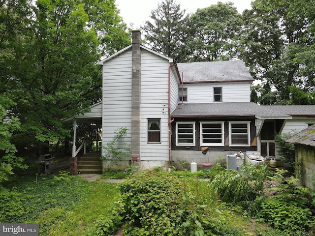 1330 Susquehannock Dr, Drumore, PA 17518 - back of property with a chimney and a shingled roof