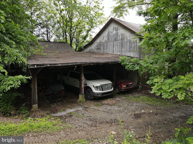 1330 Susquehannock Dr, Drumore, PA 17518 - view of property exterior featuring a carport and dirt driveway