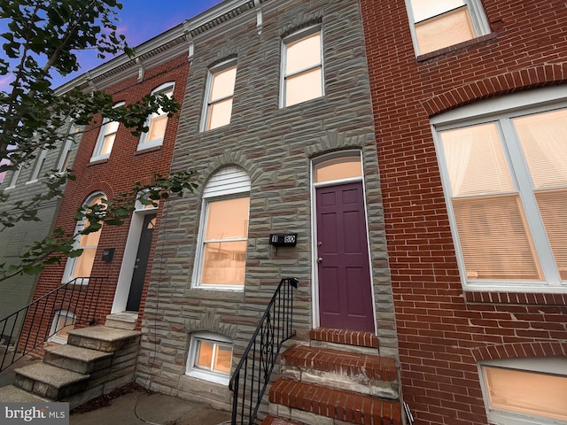 1180 Cleveland St, Baltimore, MD 21230 - view of property featuring stone siding