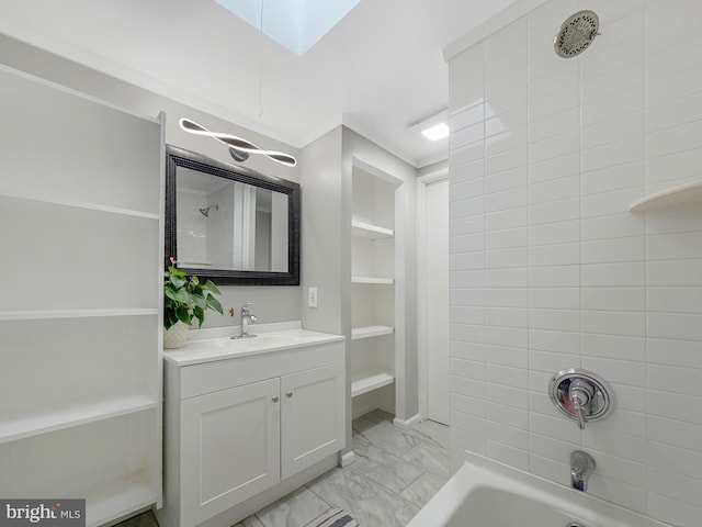 1180 Cleveland St, Baltimore, MD 21230 - full bath with marble finish flooring, vanity,  shower combination, a skylight, and built in features