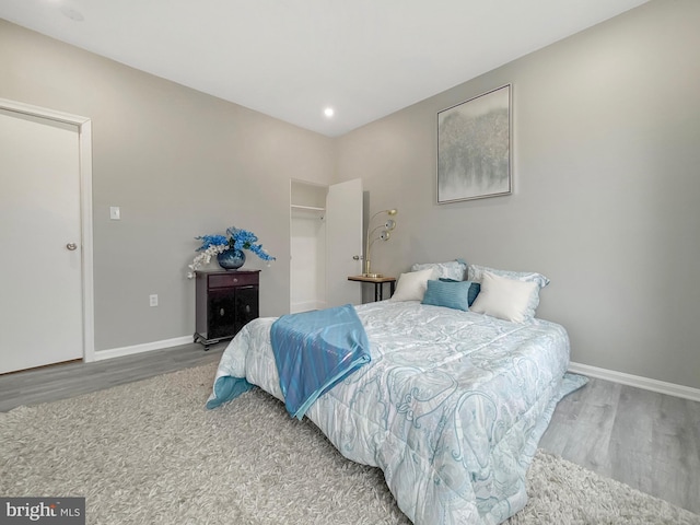 1180 Cleveland St, Baltimore, MD 21230 - bedroom featuring wood finished floors and recessed lighting