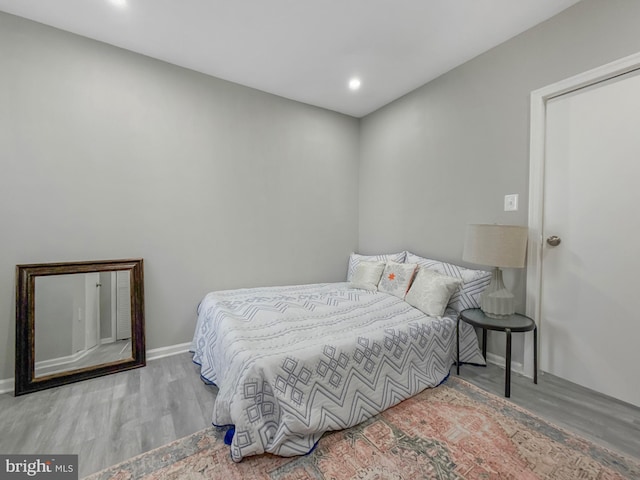 1180 Cleveland St, Baltimore, MD 21230 - bedroom with wood finished floors and recessed lighting
