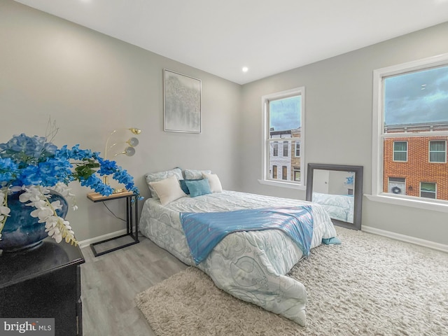 1180 Cleveland St, Baltimore, MD 21230 - bedroom with wood finished floors and recessed lighting