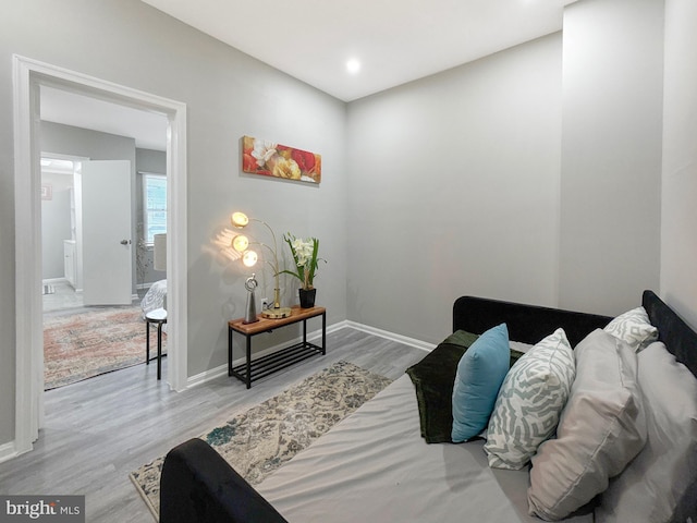 1180 Cleveland St, Baltimore, MD 21230 - bedroom featuring wood finished floors and baseboards
