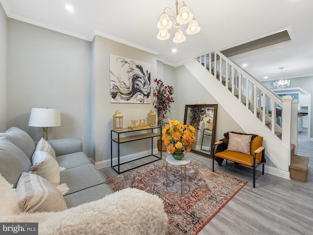 1180 Cleveland St, Baltimore, MD 21230 - living room with a chandelier, wood finished floors, stairway, crown molding, and recessed lighting